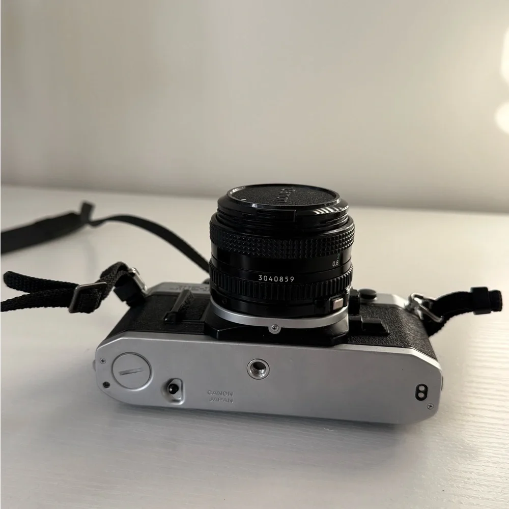 Canon AE-1 35mm film SLR camera with 50mm lens